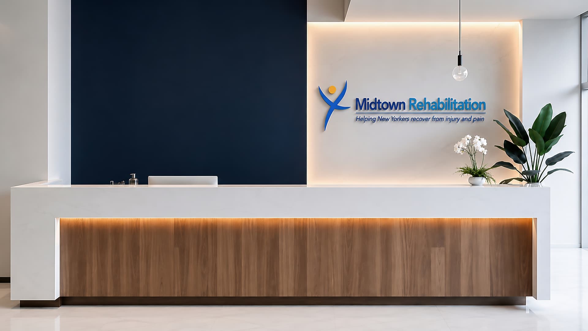 Midtown Rehabilitation reception desk with branded logo wall